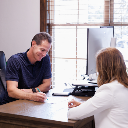 Loan Officer assisting customer